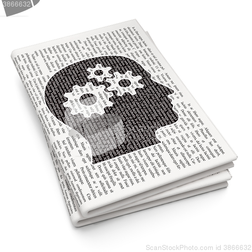 Image of Data concept: Head With Gears on Newspaper background