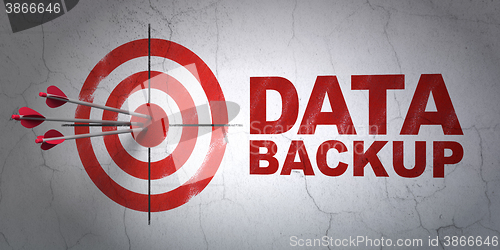 Image of Information concept: target and Data Backup on wall background