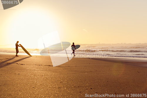 Image of Surfers on the beach