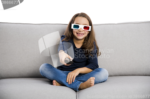 Image of Girl holding a TV remote