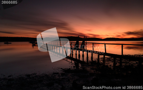 Image of Summer sunset silhouettes at Kincumber jetty