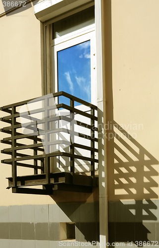 Image of door with reflection sky