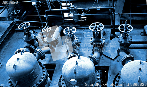 Image of Industrial zone, Steel pipelines in blue tones