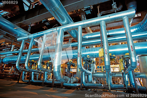 Image of Equipment, cables and piping as found inside of a modern industr