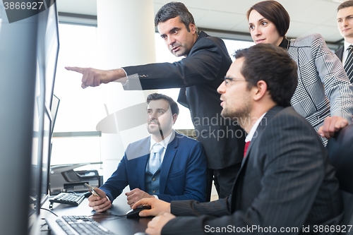 Image of Business team working in corporate office.