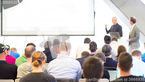 Image of Male speeker having talk at public event.