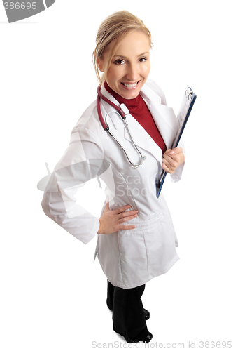 Image of Smiling female doctor with medical folder