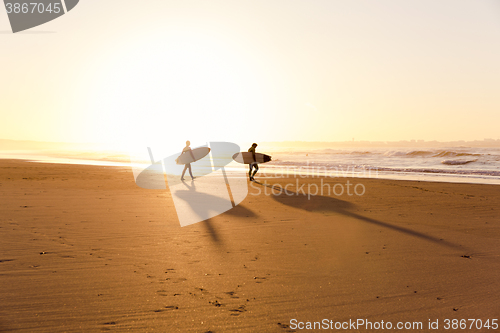Image of Surfers on the beach