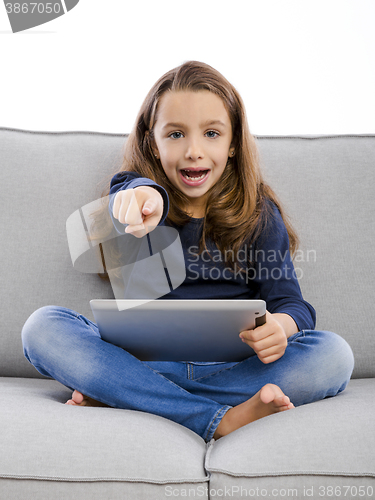 Image of Little girl with a tablet