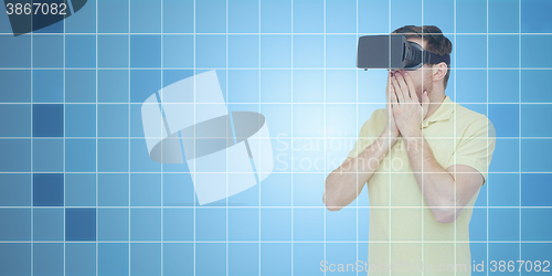 Image of happy man in virtual reality headset or 3d glasses