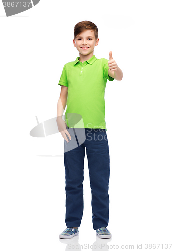 Image of happy boy in green polo t-shirt showing thumbs up