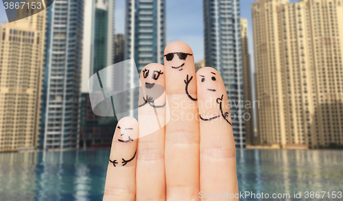 Image of close up of fingers with smiley faces