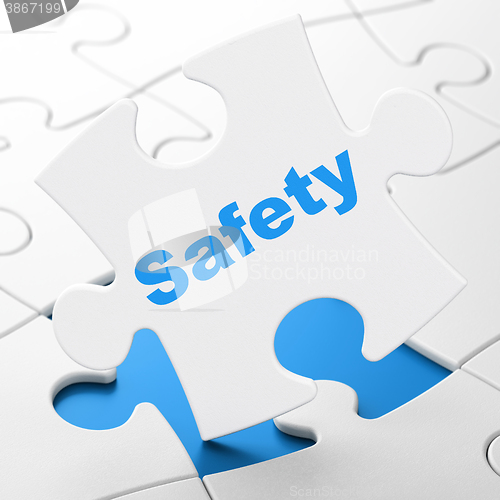 Image of Security concept: Safety on puzzle background