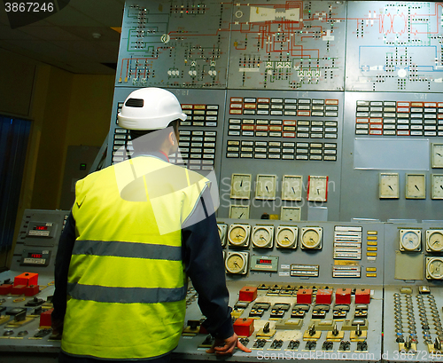 Image of Operator at work place in the system control room