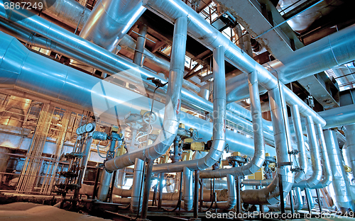 Image of Industrial zone, Steel pipelines, valves and ladders