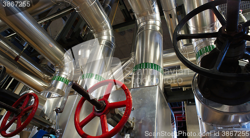Image of Equipment, cables and piping as found inside of a modern industr