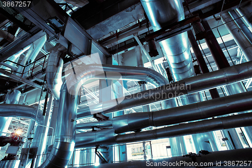 Image of Industrial zone, Steel pipelines, valves, cables and walkways