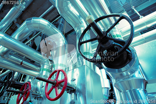 Image of Industrial zone, Steel pipelines, valves, cables and walkways