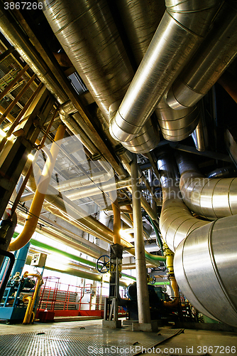 Image of Equipment, cables and piping as found inside of  industrial powe