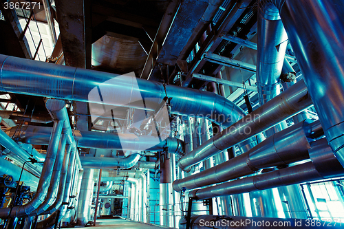 Image of Equipment, cables and piping as found inside of a modern industr