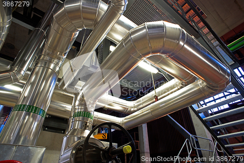 Image of Industrial zone, Steel pipelines, valves, cables and walkways