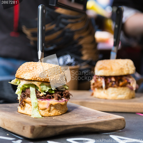 Image of Beef burgers being served on street food stall