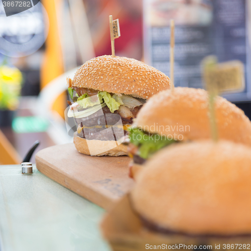 Image of Beef burgers being served on street food stall