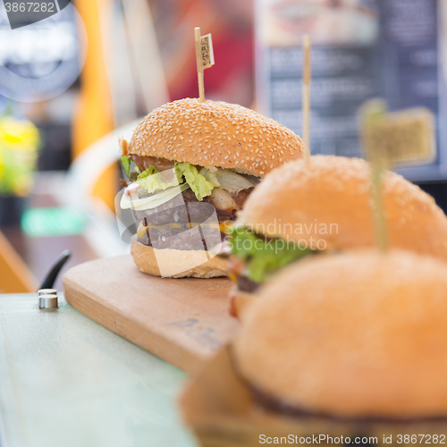 Image of Beef burgers being served on street food stall