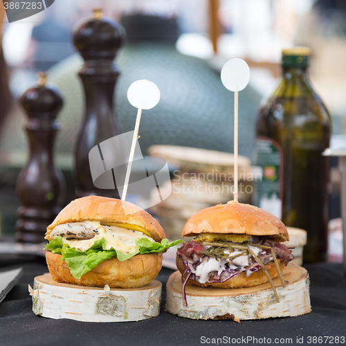 Image of Beef burgers being served on street food stall