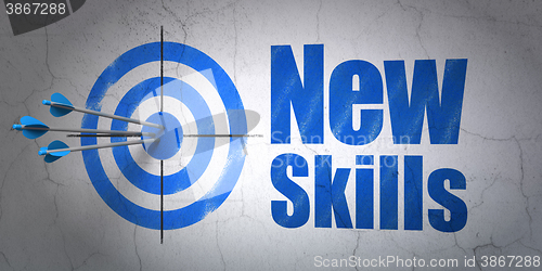 Image of Studying concept: target and New Skills on wall background