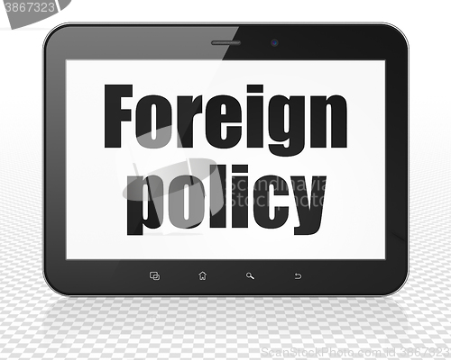 Image of Politics concept: Tablet Pc Computer with Foreign Policy on display