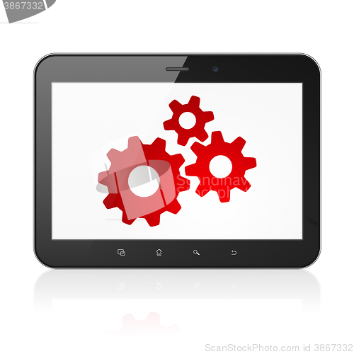 Image of Information concept: Tablet Computer with Gears on display