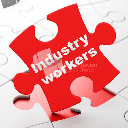 Image of Industry concept: Industry Workers on puzzle background