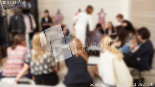 Image of blurred image of shopping mall and people