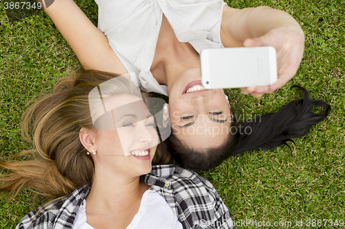 Image of Best friends taking selfies