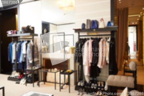 Image of Blurred clothing boutique interior background 