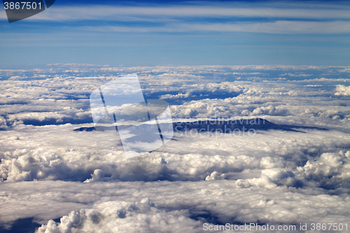 Image of Top view on clouds and mountains