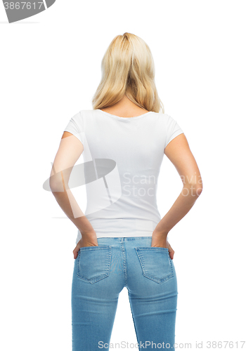 Image of rear view of young woman in blank white t-shirt