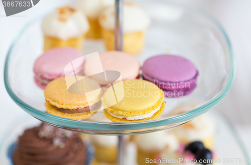 Image of close up of cake stand with macaroon cookies