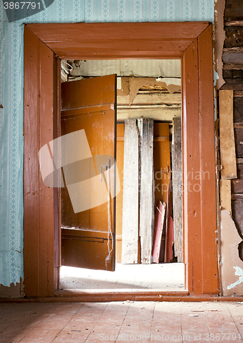 Image of abandoned wooden house interior