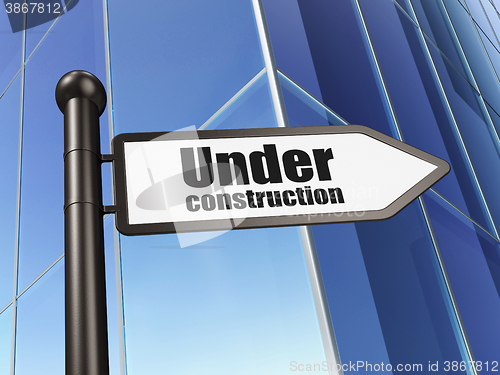 Image of Web development concept: sign Under Construction on Building background