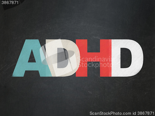 Image of Health concept: ADHD on School board background