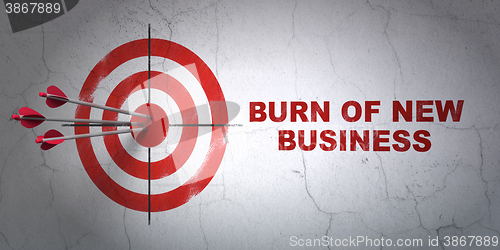 Image of Business concept: target and Burn Of new Business on wall background