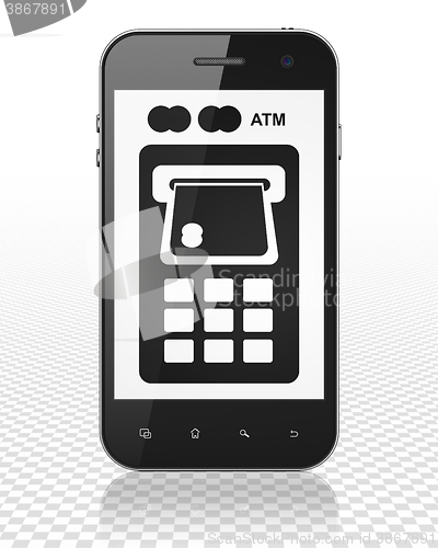 Image of Money concept: Smartphone with ATM Machine on display
