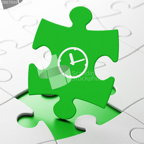 Image of Time concept: Clock on puzzle background