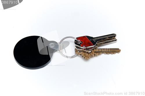 Image of keyring with three keys over white and black blank fob