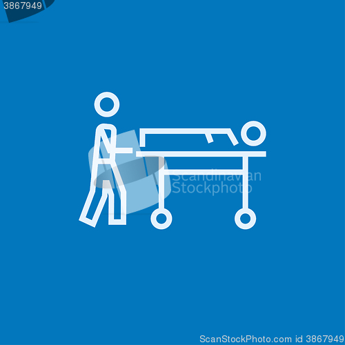 Image of Man pushing stretchers line icon.