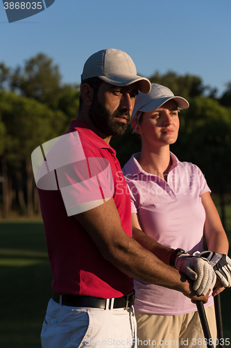 Image of portrait of couple on golf course