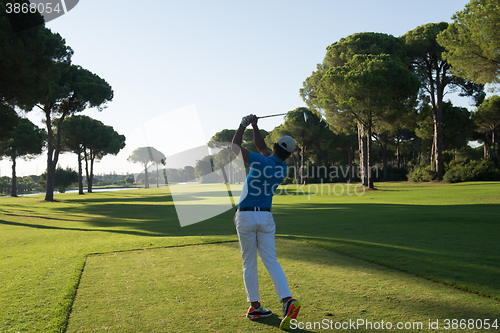 Image of golf player hitting shot