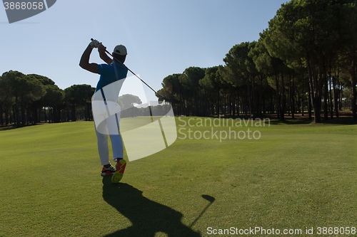 Image of golf player hitting shot